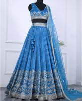 Blue Tapeta Silk Lehenga Choli with Silver Zari Sequin Detailing