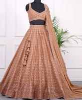 Light Orange Sequins-Embellished Georgette Lehenga Choli