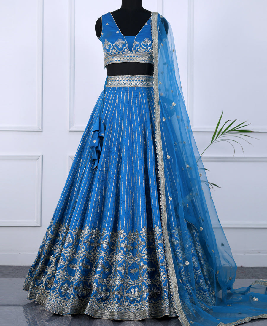 Blue Tapeta Silk Lehenga Choli with Silver Zari Sequin Detailing
