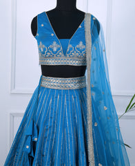 Blue Tapeta Silk Lehenga Choli with Silver Zari Sequin Detailing