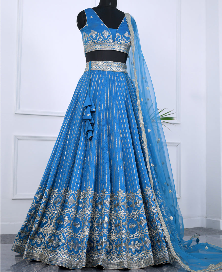 Blue Tapeta Silk Lehenga Choli with Silver Zari Sequin Detailing